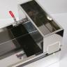 Attachment Clips Hold Feed Pans in Place